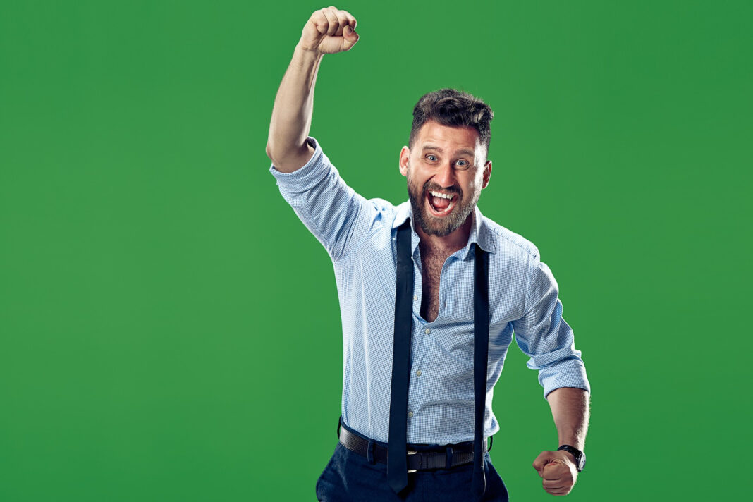 winning-success-happy-man-celebrating-being-winner-dynamic-image-caucasian-male-model-green-wall-victory-delight-concept-human-facial-emotions-concept winning-success-happy-man-celebrating-being-winner-dynamic-image-caucasian-male-model-green-wall-victory-delight-concept-human-facial-emotions-concept0